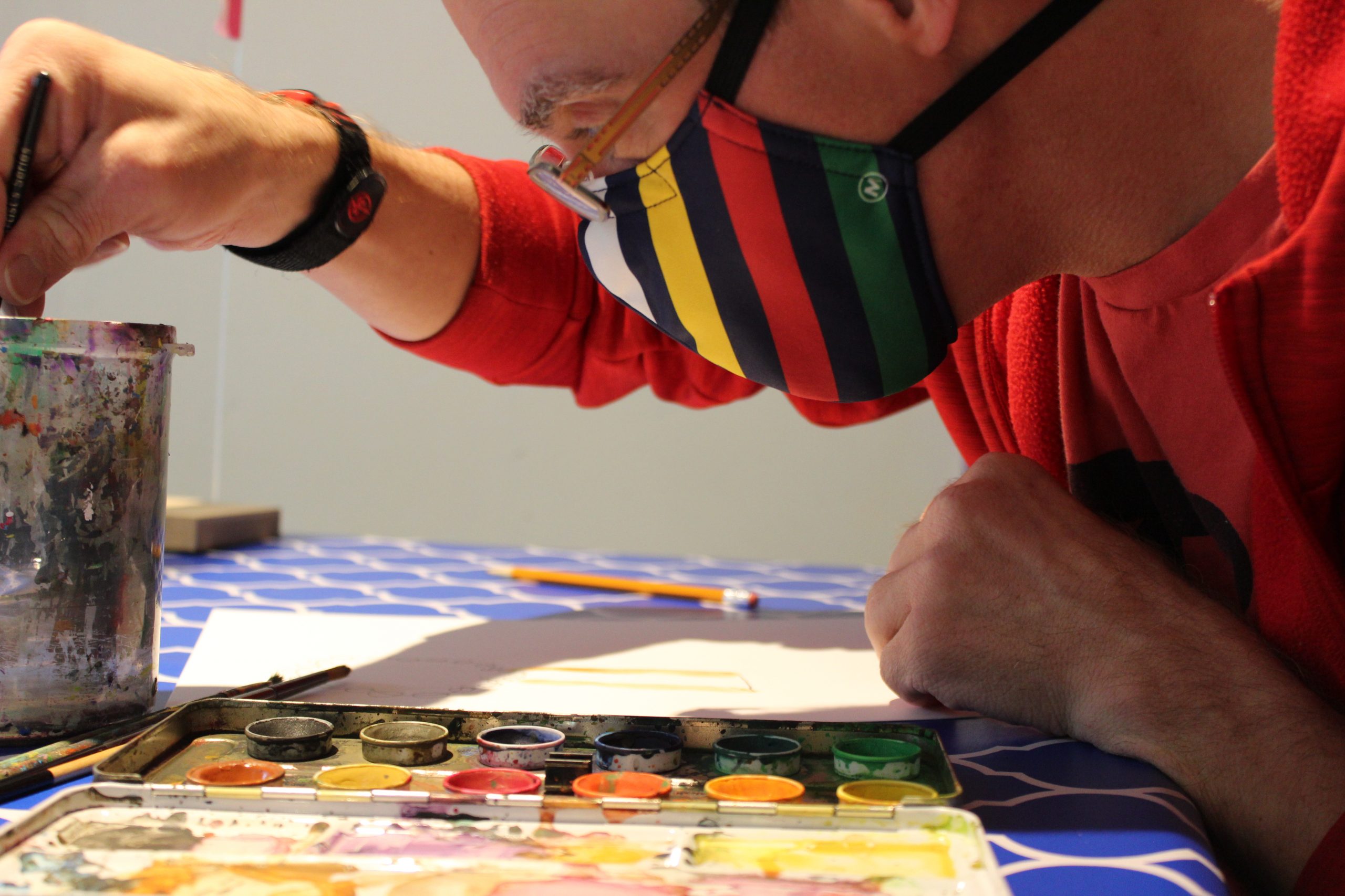 Masked H'art artists works on watercolour
