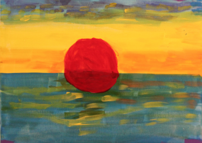 Canvas of red sunset reflected over water