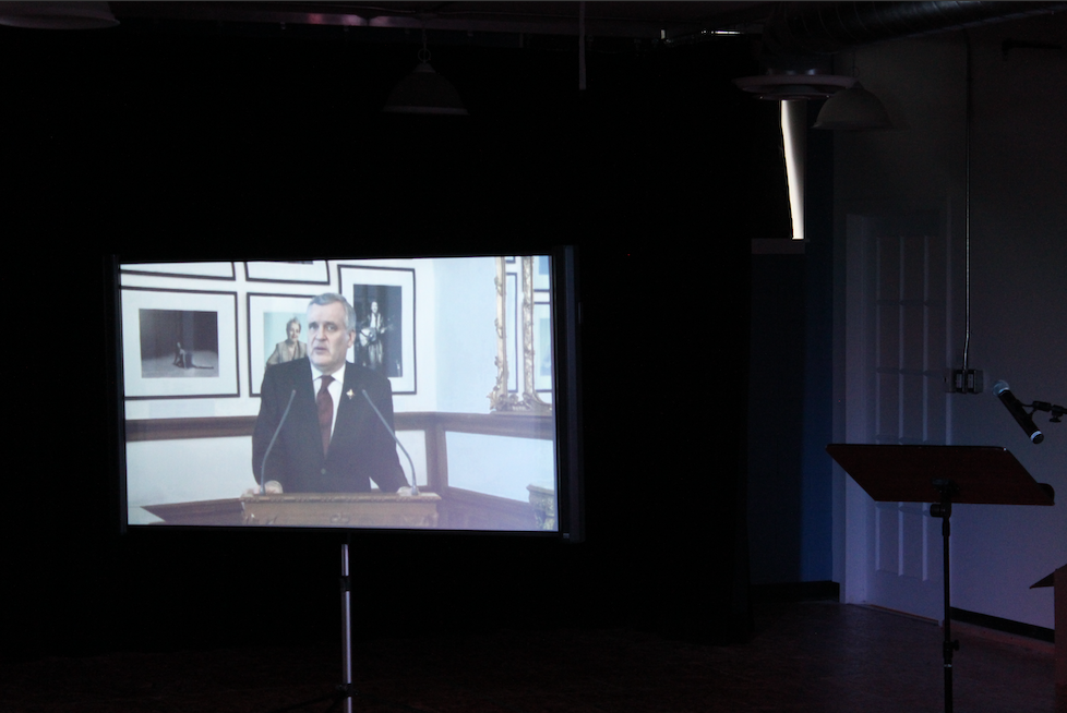 Lt.-Gov David Onley on a video screen giving an address